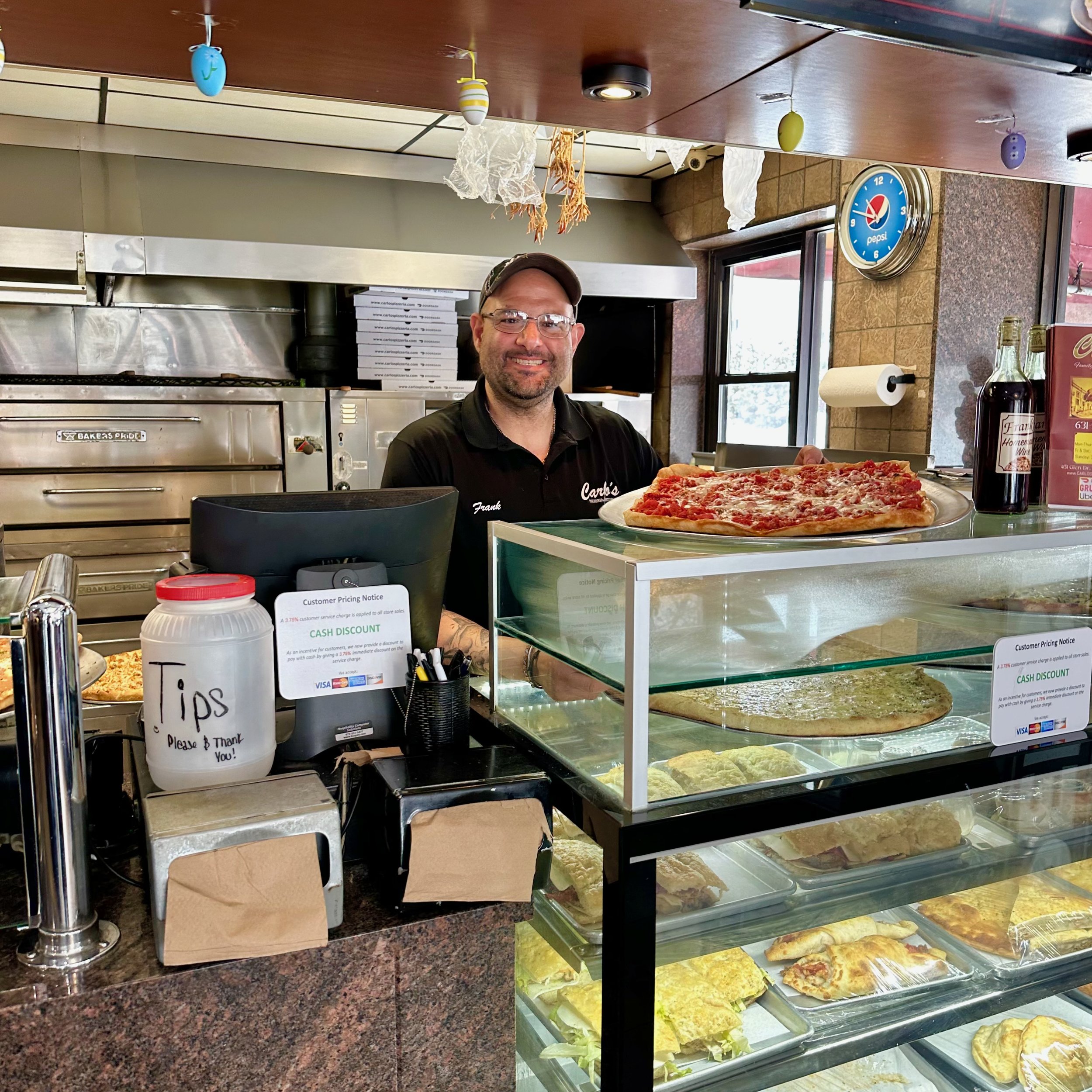 Frank, owner and operator of Carlo's Pizzeria and Ristorante in Shirley, NY