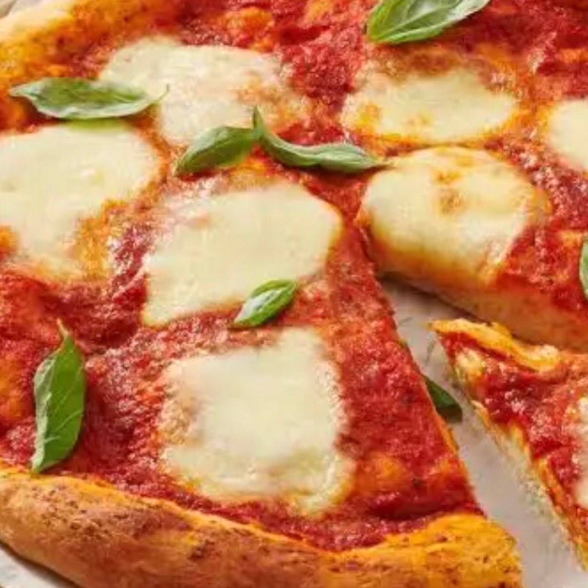 Margherita pizza with fresh mozzarella and basil at Carlo's